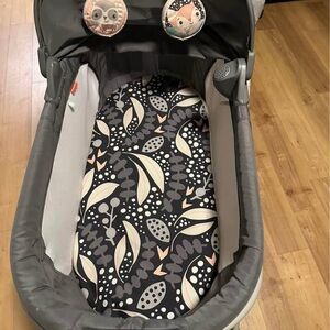 Gray and Black Baby Bassinet with Patterned Mattress